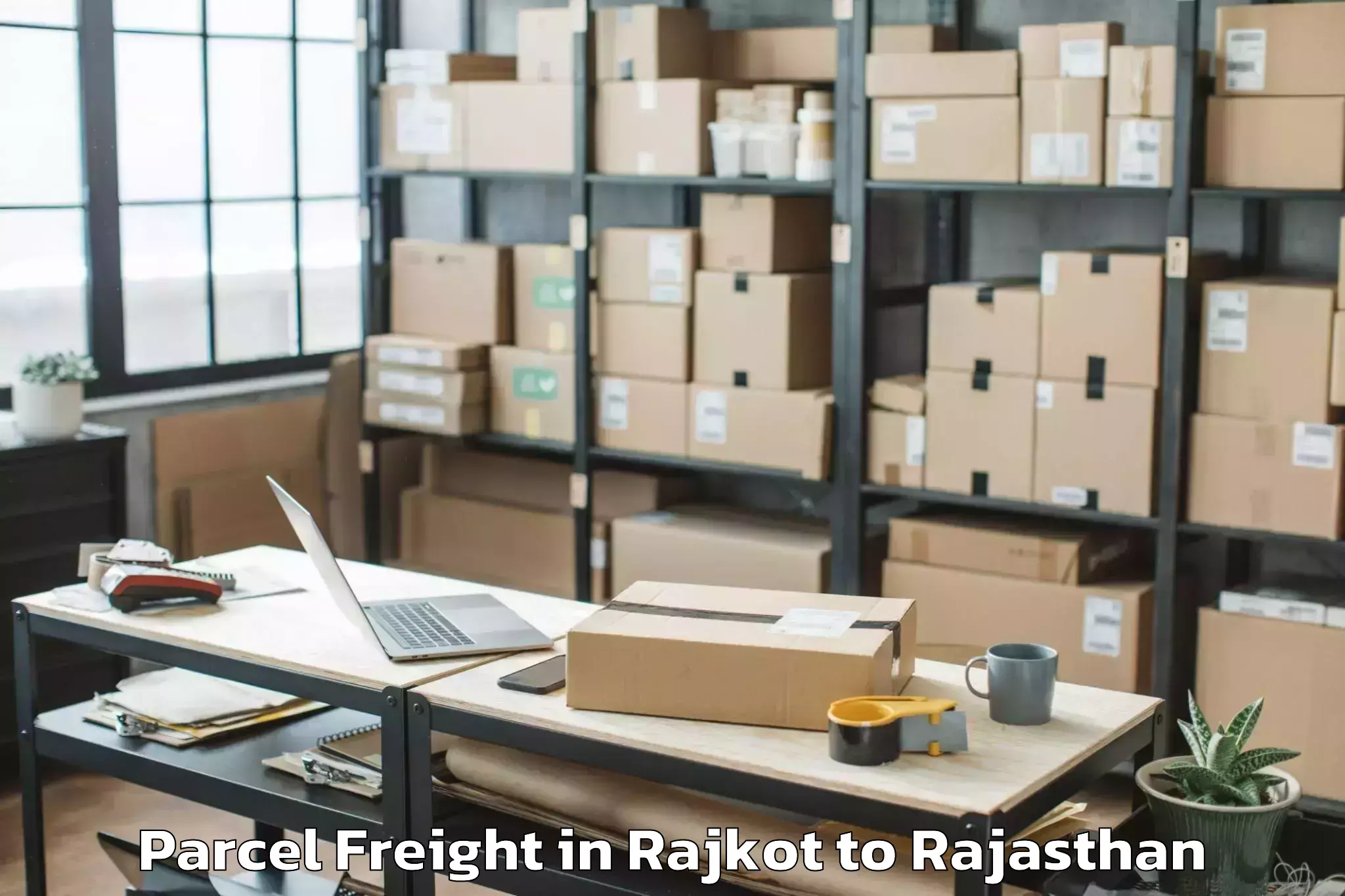 Book Your Rajkot to Mewar University Chittorgarh Parcel Freight Today